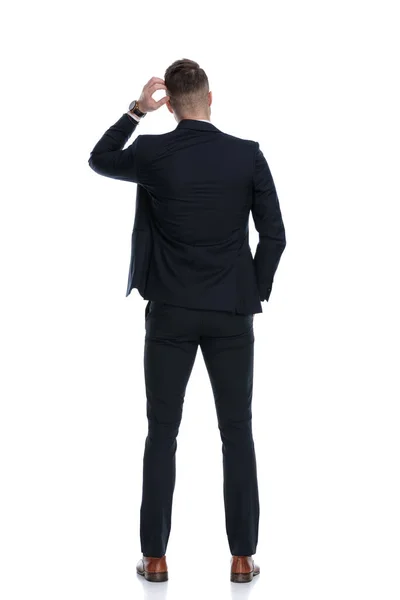 Back View Confused Businessman Scratching His Head Hand Pocket While — Stock Photo, Image