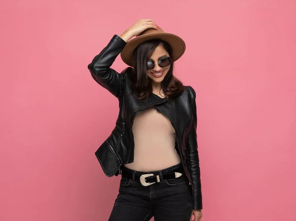 Positive Fashion Model Taking Hat Smiling Wearing Sunglasses While Standing — Stock Photo, Image