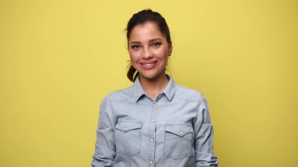 Casual Young Woman Blue Denim Shirt Crossing Arms Smiling Posing — Stock Video