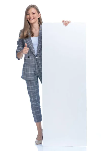 Happy Young Businesswoman Blue Checkered Suit Making Thumbs Gesture Presenting — Stock Photo, Image