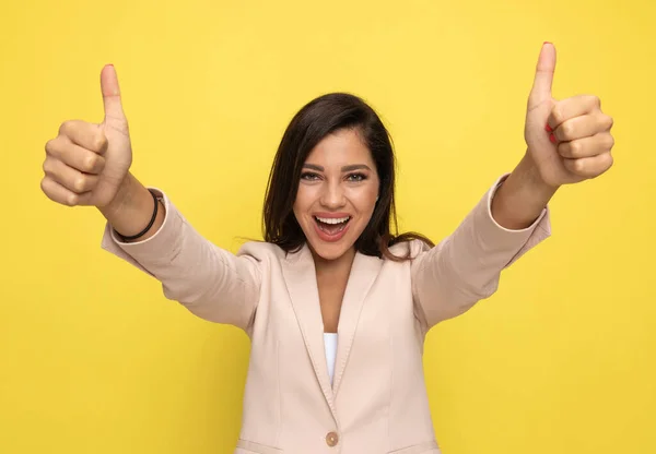 Enthusiastic Young Girl Pink Suit Making Thumbs Gesture Laughing Standing — Stock Photo, Image