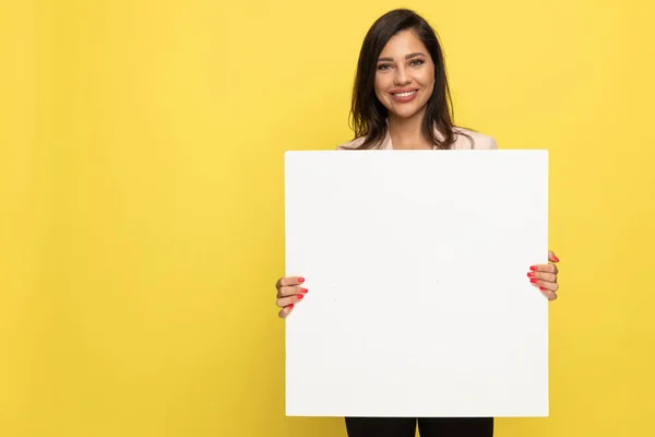 Happy Young Girl Pink Suit Holding Empty Board Presenting Smiling — Stock Photo, Image