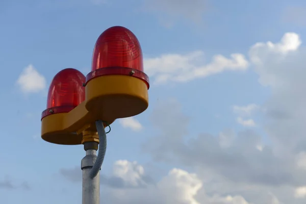 Safety lights on top of a building - to warn planes. Aviation lights.