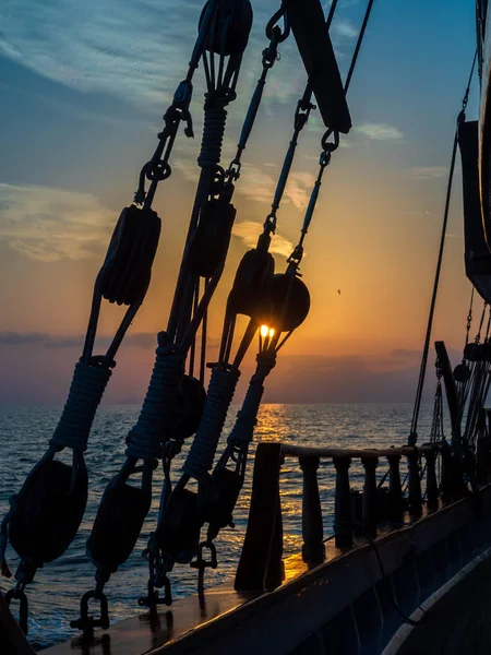 Sunset at the Sailboat deck while cruising in the Cyclades in Greece