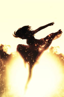 Exlpoding arka plan üzerinde dansçı