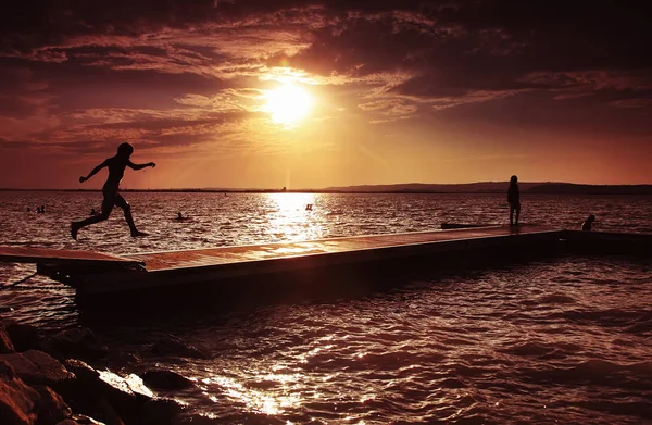 Child Jumping Coast Sunshine — Stock Photo, Image