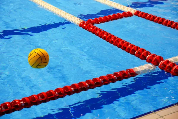 Colorful water ball in swimming-pool