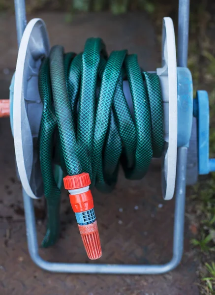 Garden Hose Rolled Holder — Stock Photo, Image