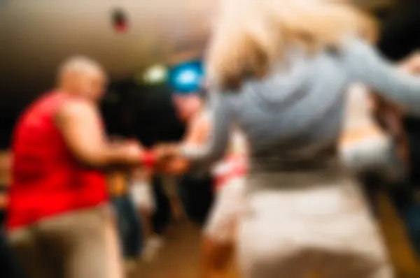 Folk dansar oskärpa bakgrund — Stockfoto