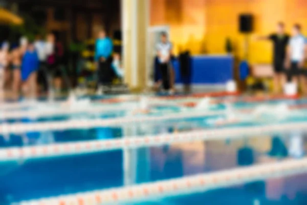 Natación competencia tema desenfoque fondo — Foto de Stock