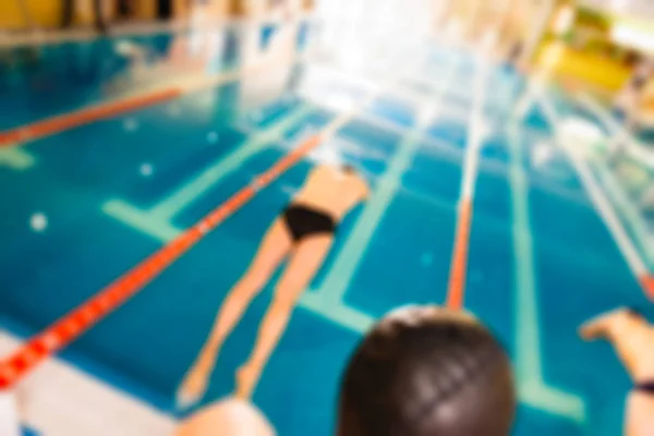 游泳比赛主题模糊背景 — 图库照片