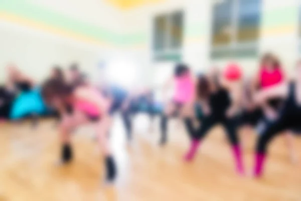 Aula de dança para mulheres desfocar fundo — Fotografia de Stock