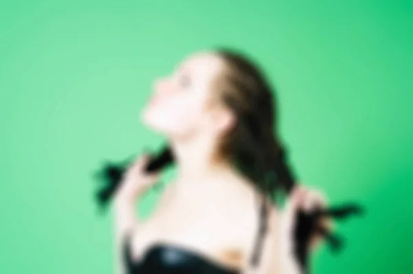 Woman wearing bdsm submissive outfit blur background — Stock Photo, Image