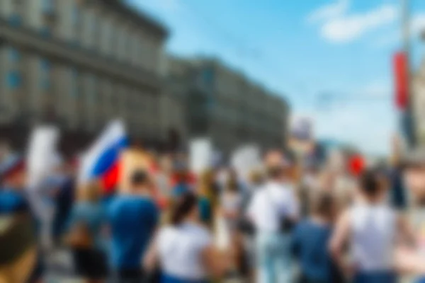 Large crowd parade theme blur background — Stock Photo, Image