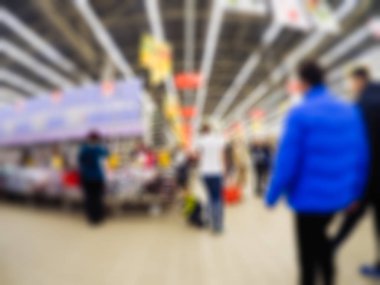 İnsanlar alışveriş mağazası temada arka plan bulanıklık