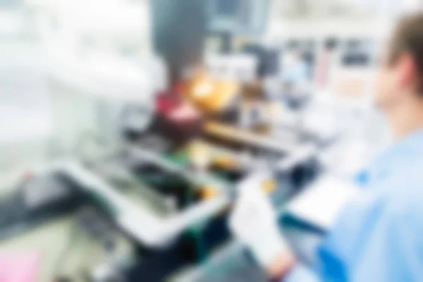 Electronics production plant theme blur background