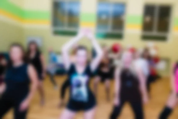 Aula de dança para mulheres desfocar fundo — Fotografia de Stock