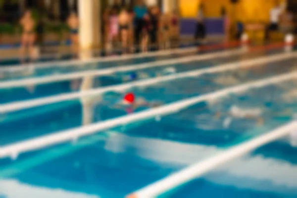 Concorso di nuoto tema sfocatura sfondo — Foto Stock