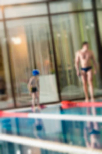 Svømning konkurrence tema sløre baggrunden - Stock-foto
