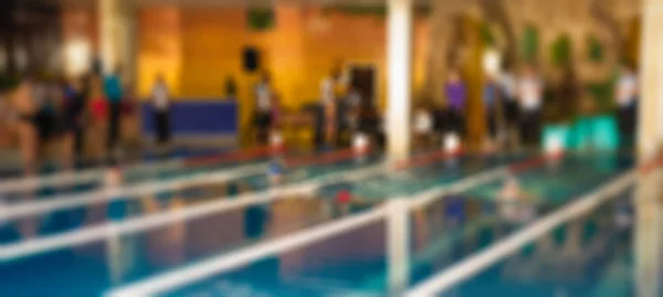 Natación competencia tema desenfoque fondo —  Fotos de Stock