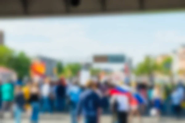 Grande multidão desfile tema borrão fundo — Fotografia de Stock