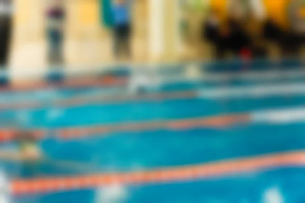 Natación competencia tema desenfoque fondo — Foto de Stock