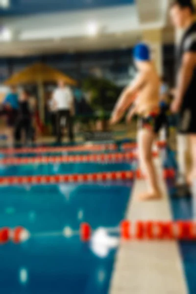 Natación competencia tema desenfoque fondo — Foto de Stock