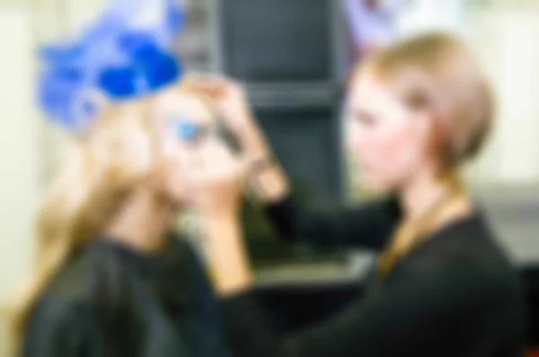 Maquiagem e artistas de cabelo competição desfoque fundo — Fotografia de Stock