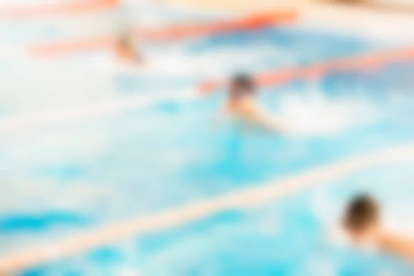 Zwemmen competitie thema vervagen achtergrond — Stockfoto