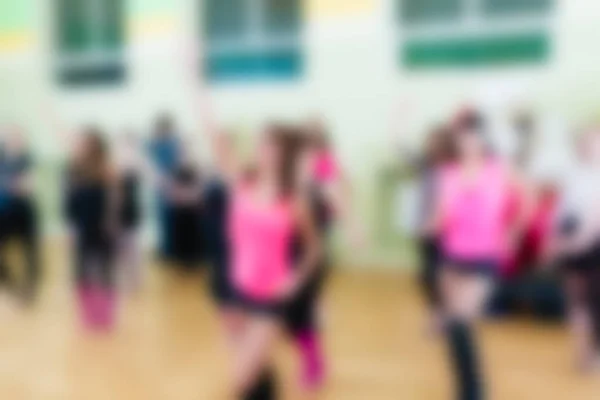 Aula de dança para mulheres desfocar fundo — Fotografia de Stock