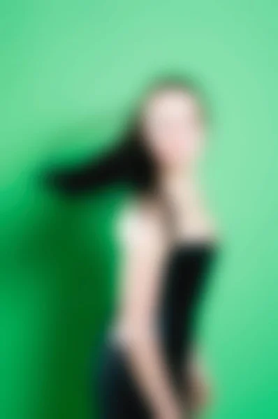 Frau trägt bdsm unterwürfiges Outfit verschwimmen Hintergrund — Stockfoto