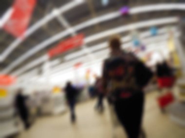 İnsanlar alışveriş mağazası temada arka plan bulanıklık
