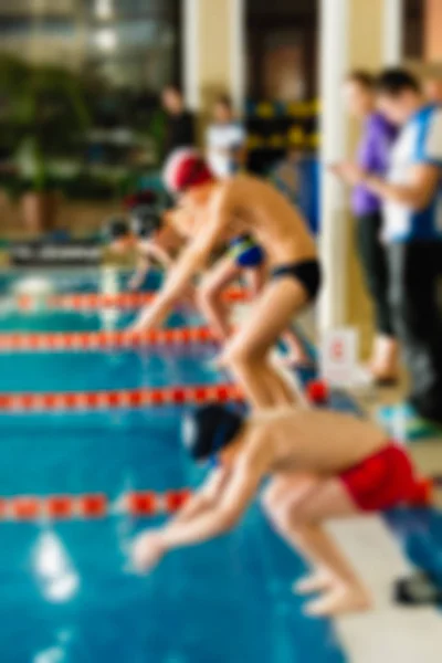 Natation thème de la compétition fond flou — Photo