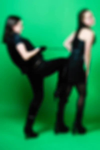 Playful bdsm women theme blur background — Stock Photo, Image