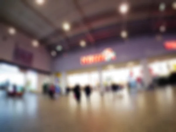 Persone shopping nei grandi magazzini tema sfocatura sfondo — Foto Stock