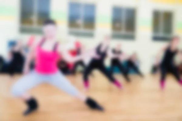 Danslektion för kvinnor oskärpa bakgrund — Stockfoto