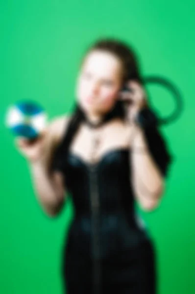 Woman wearing bdsm submissive outfit blur background — Stock Photo, Image