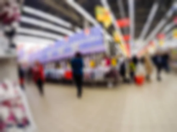 Pessoas fazendo compras em loja de departamento tema borrão fundo — Fotografia de Stock