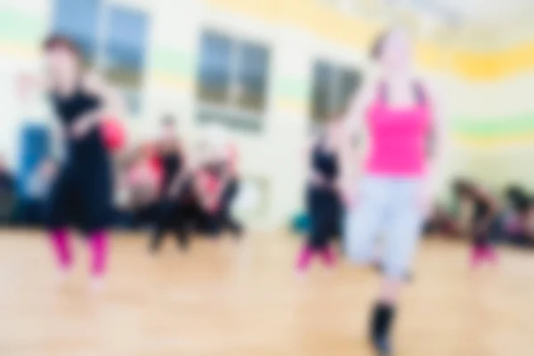 Klasa taniec dla kobiet rozmycie tła — Zdjęcie stockowe