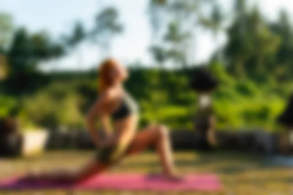 Yoga at Bali Indonesia Travel theme blur background