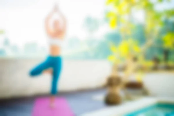 Yoga at Bali Indonesia Travel theme blur background