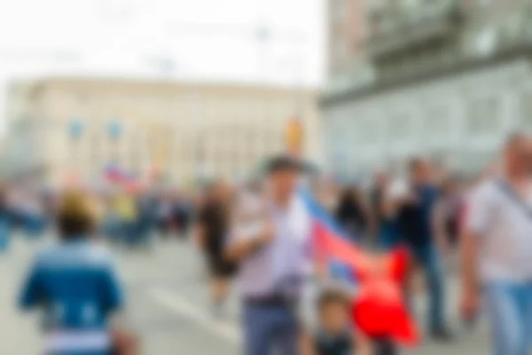 Grande multidão desfile tema borrão fundo — Fotografia de Stock