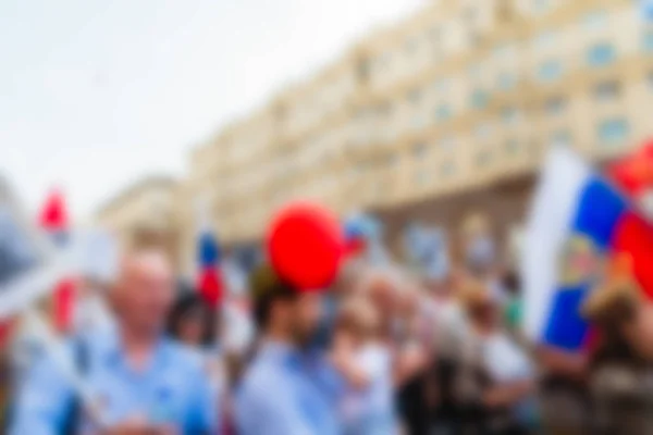 Grote menigte parade thema achtergrond wazig — Stockfoto