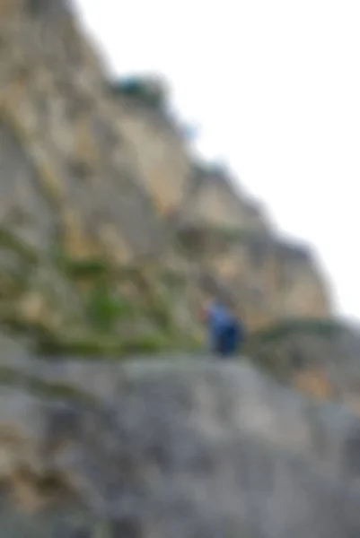 ธีมการท่องเที่ยวปีนเขาเบลอพื้นหลัง — ภาพถ่ายสต็อก