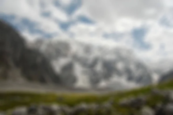 Bergsbestigning turism tema oskärpa bakgrund — Stockfoto
