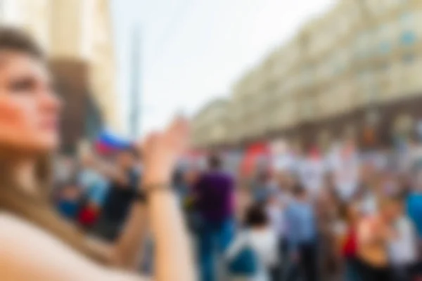 Grande multidão desfile tema borrão fundo — Fotografia de Stock