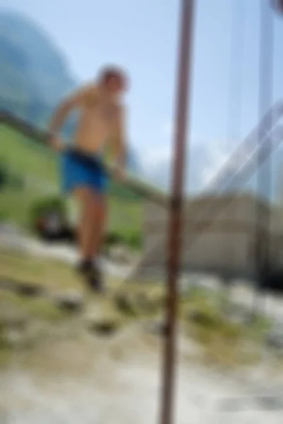 Bergsbestigning turism tema oskärpa bakgrund — Stockfoto