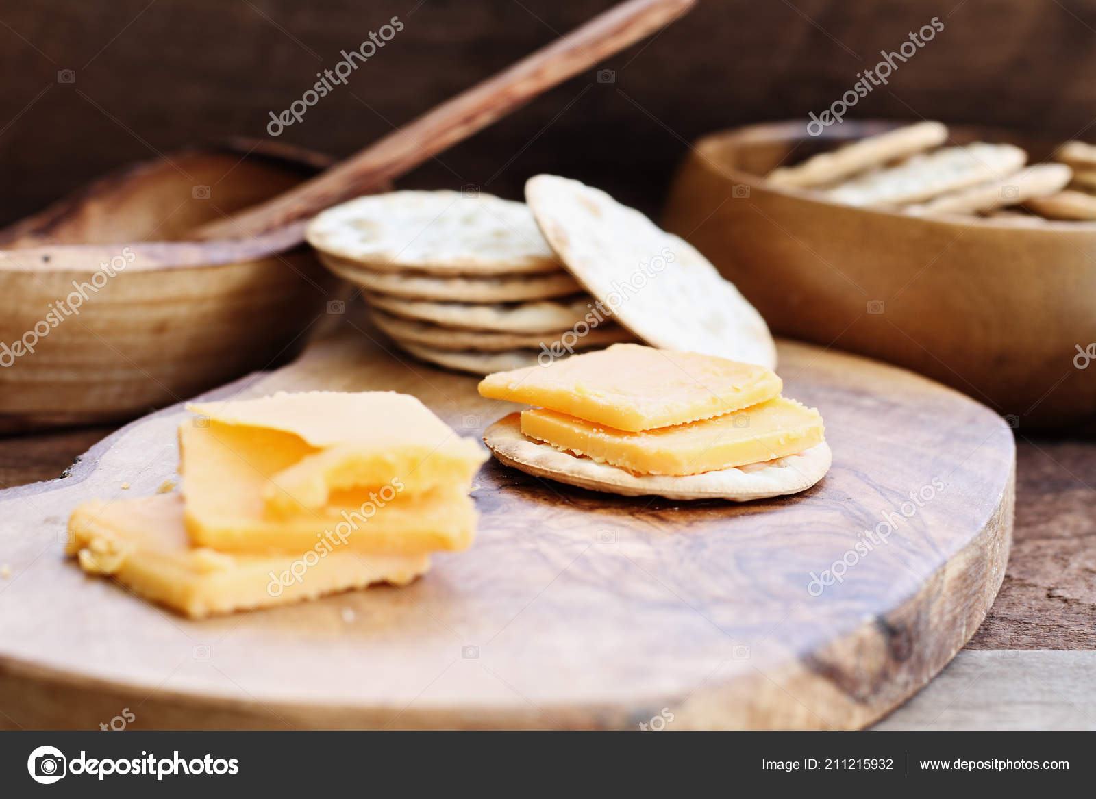 Cheddar Cheese Water Cracker Appetizer Rustic Background Stock Photo by ©StephanieFrey 211215932