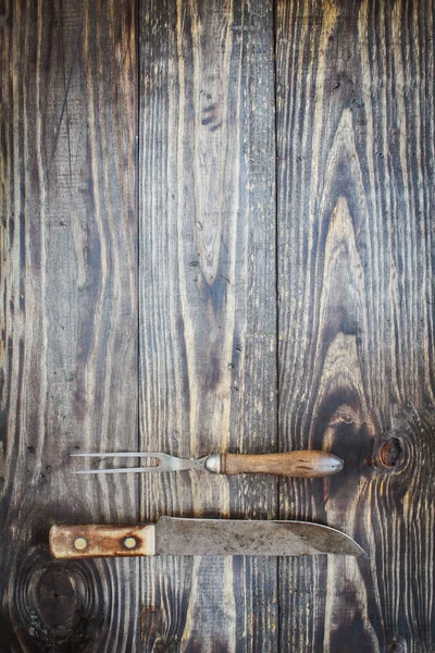 Tenedor de carne vintage y cuchillo de carnicero — Foto de Stock