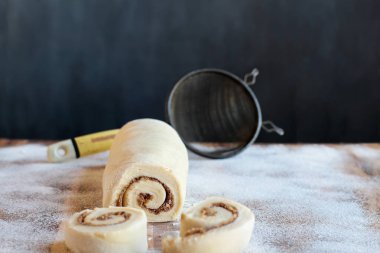  Cinnamon Roll Dough over Floured Surface